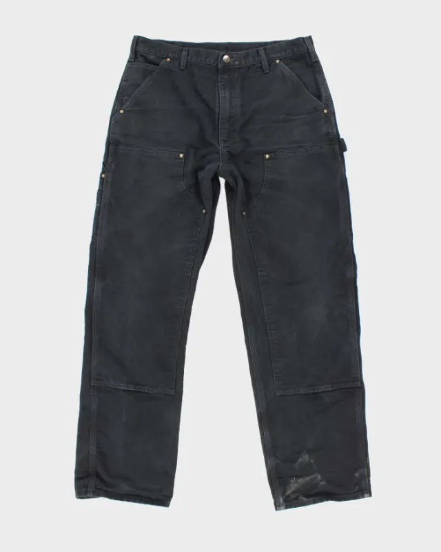 Vintage Carhartt Heavyweight Double Knee Faded Carpenter Trousers - W32 L30 sold by Rokit
