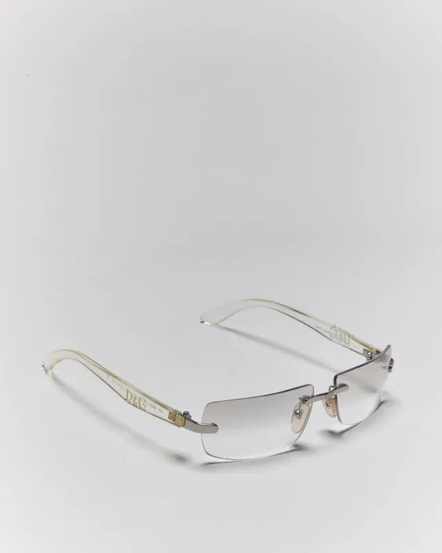 Vintage Y2k 00s Dolce & Gabbana Rimless Clear Tinted Sunglasses sold by Rokit