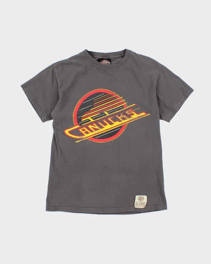 Vintage 2000's Vancouver Canucks NHL Graphic T-Shirt - S sold by Rokit