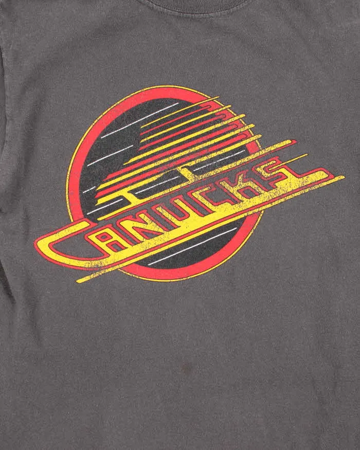 Vintage 2000's Vancouver Canucks NHL Graphic T-Shirt - S sold by Rokit product image thumbnail 3