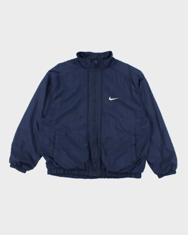 Vintage 90's Nike Oversized Small Swoosh Windbreaker Jacket - XL sold by Rokit