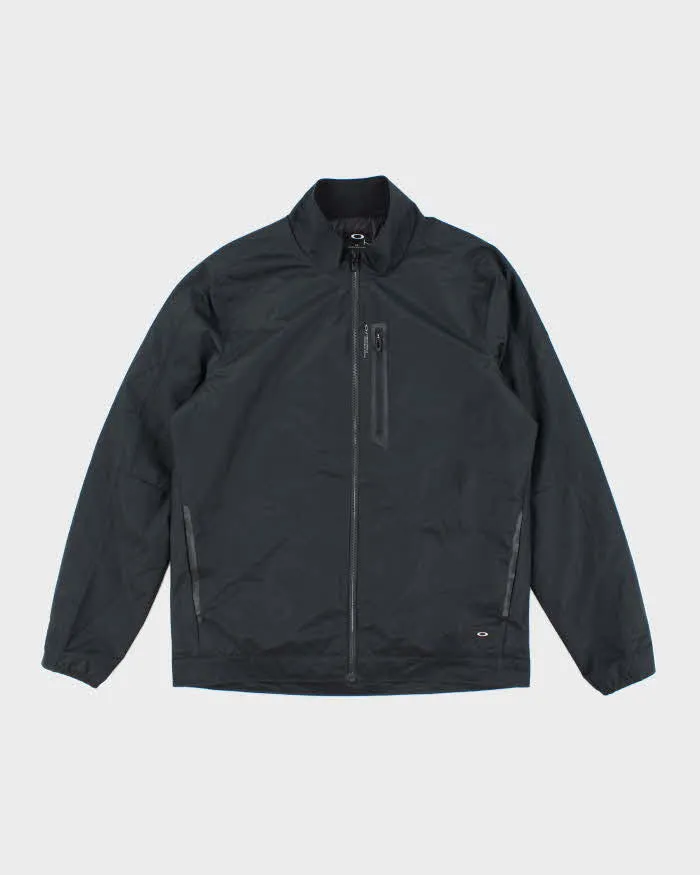 Vintage 2000's Oakley Lightweight Windbreaker Jacket - L sold by Rokit