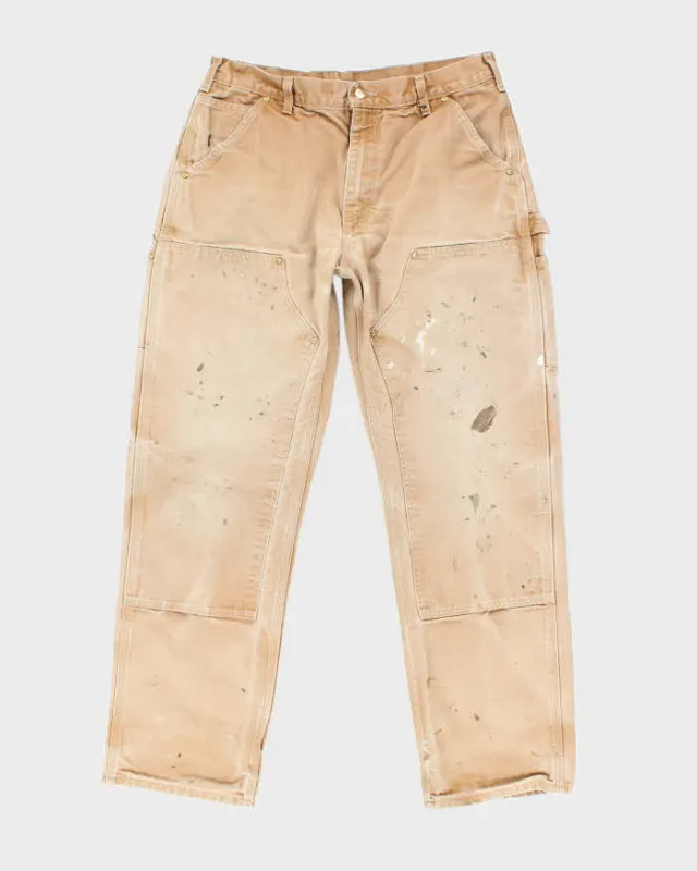 Vintage 90's Carhartt Faded Beige Double Knee Carpenter Trousers - W32 L30 sold by Rokit