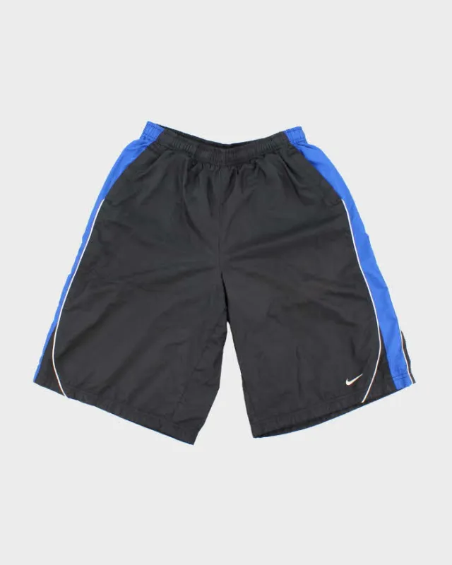 Vintage Y2K Nike Lightweight Netted Sports Shorts - XL sold by Rokit
