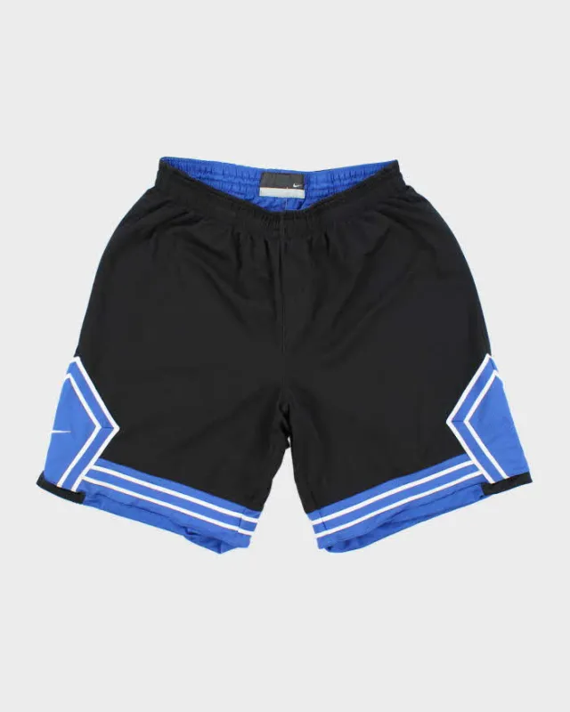 Vintage Y2K Nike Wide Leg Sports Shorts - L sold by Rokit