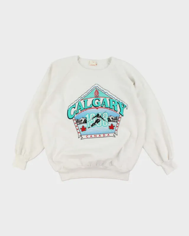 Vintage 80's Calgary Ski Graphic Print Sweatshirt - XL sold by Rokit