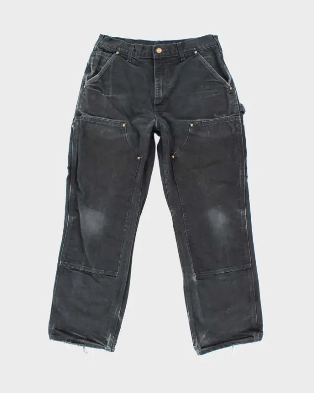 Vintage 2000's Carhartt Faded Double Carpenter Trousers - W30 L27 sold by Rokit
