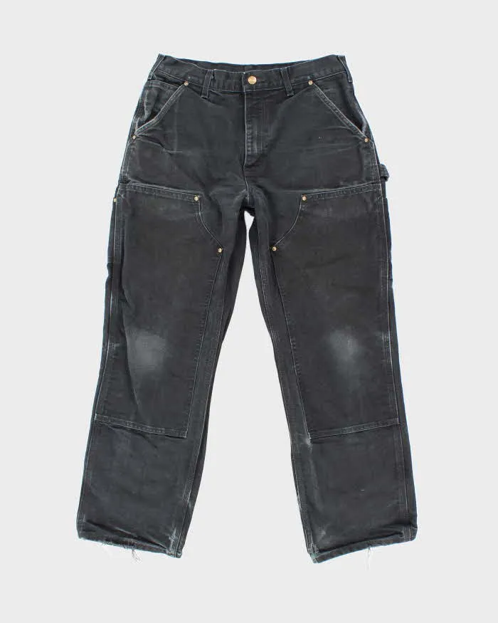 Vintage 2000's Carhartt Faded Double Carpenter Trousers - W30 L27 sold by Rokit