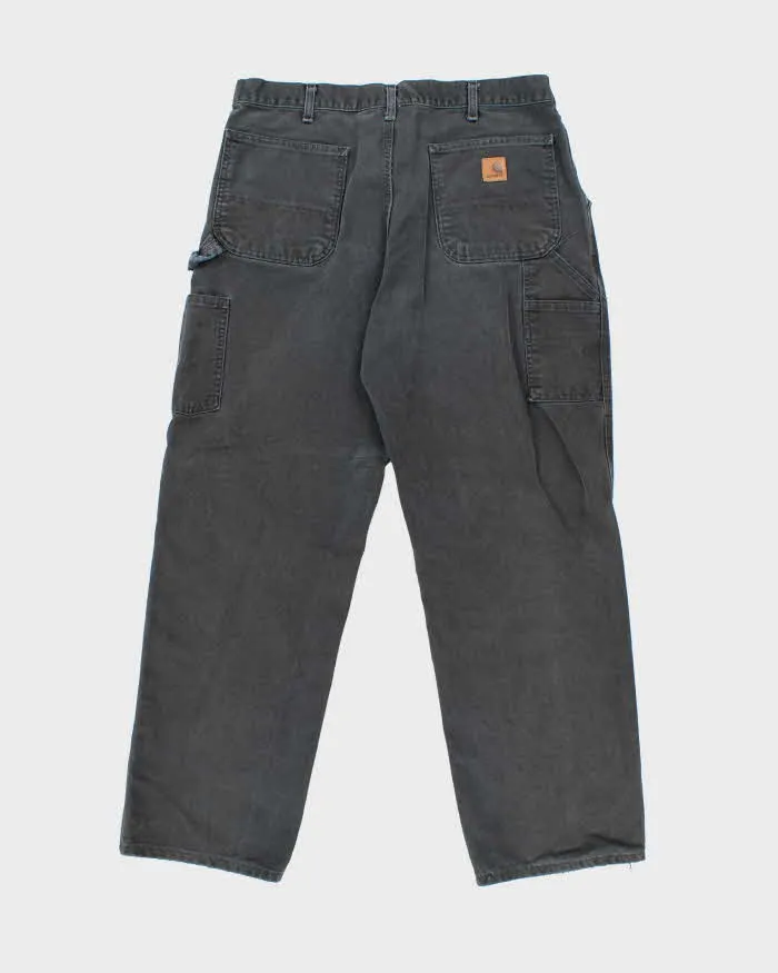 Vintage Carhartt Faded Single Knee Carpenter Trousers - W32 L29 sold by Rokit product image thumbnail 2