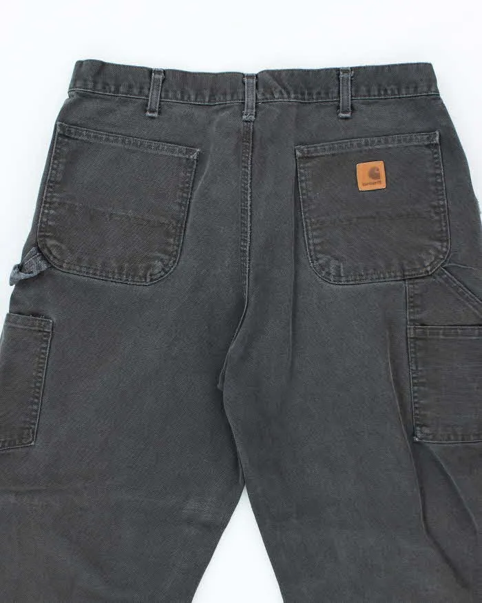 Vintage Carhartt Faded Single Knee Carpenter Trousers - W32 L29 sold by Rokit product image thumbnail 4