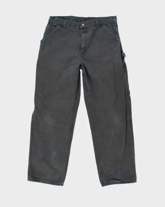 Vintage Carhartt Faded Single Knee Carpenter Trousers - W32 L29 sold by Rokit