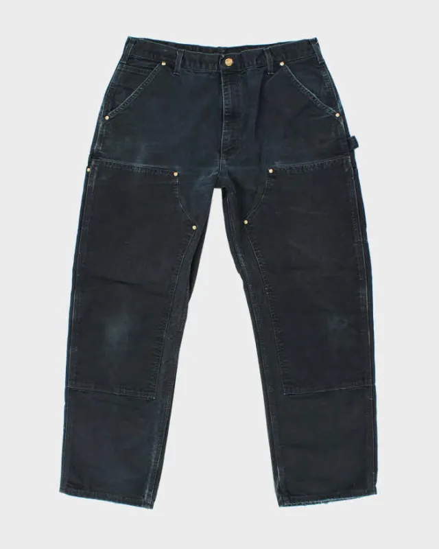 Vintage Carhartt Faded Black Double Knee Carpenter Trousers - W34 L28 sold by Rokit