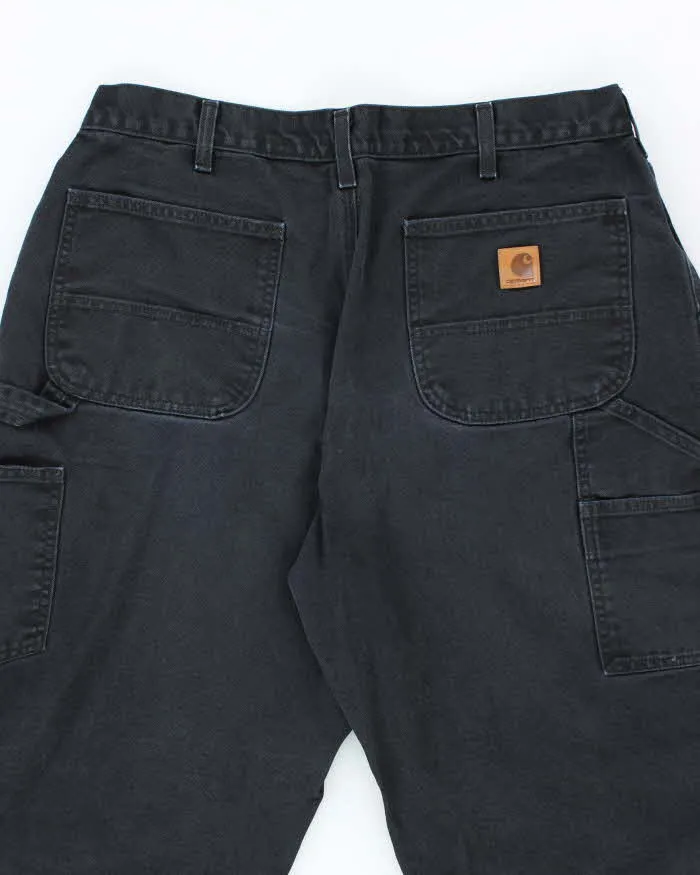 Vintage Carhartt Faded Black Single Knee Carpenter Trousers - W32 L27 sold by Rokit product image thumbnail 4
