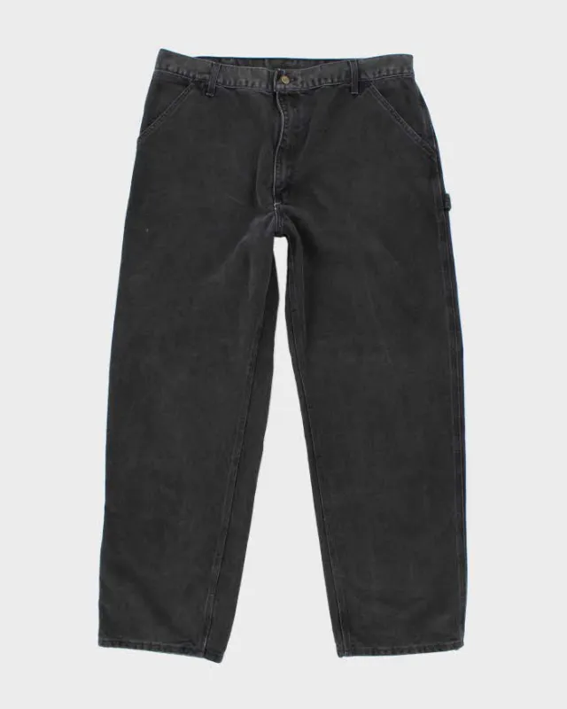 Vintage 2000's Carhartt Faded Single Knee Carpenter Trousers - W38 L30 sold by Rokit