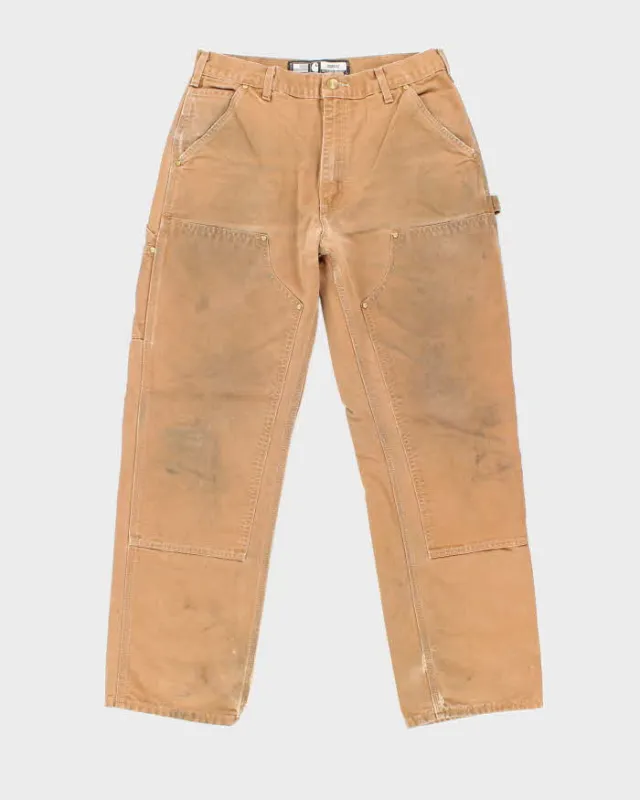 Vintage 2000's Carhartt Faded Double Knee Carpenter Trousers - W30 L30 sold by Rokit