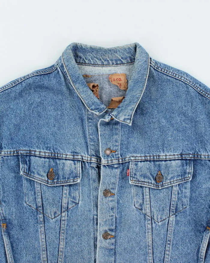 Vintage 90's Levi's Boxy Medium Wash Denim Jacket - L sold by Rokit product image thumbnail 3