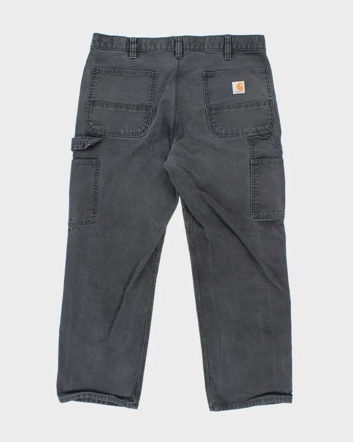 Vintage Carhartt Heavyweight Double Knee Faded Black Carpenter Trousers - W34 L26 sold by Rokit product image thumbnail 2