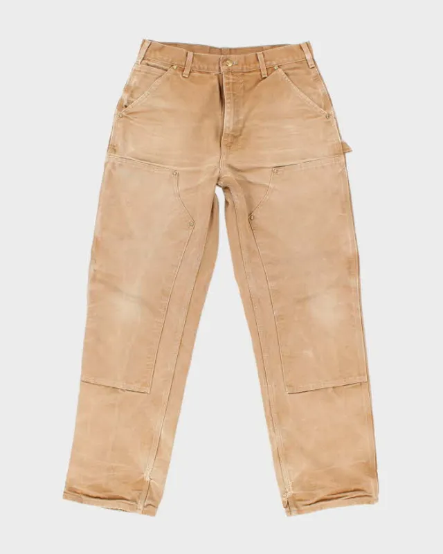 Vintage Carhartt Heavyweight Double Knee Beige Faded Carpenter Trousers - W32 L30 sold by Rokit