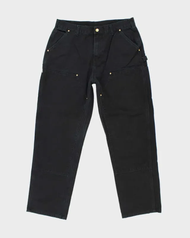 Vintage Carhartt Double Knee Black Faded Carpenter Trousers - W34 L31 sold by Rokit