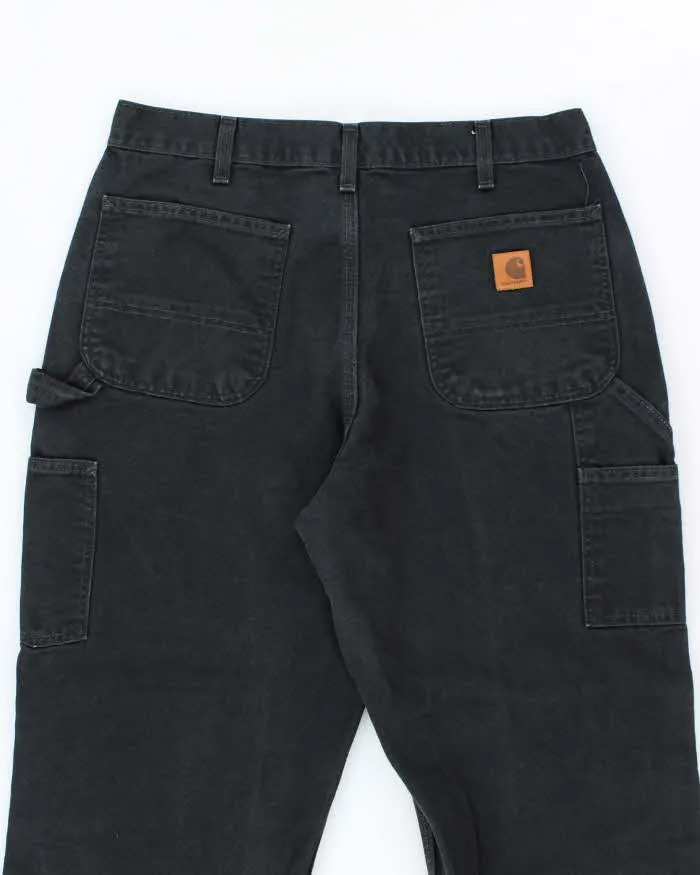Vintage Carhartt Heavyweight Single Knee Faded Black Carpenter Trousers - W34 L30 sold by Rokit product image thumbnail 4