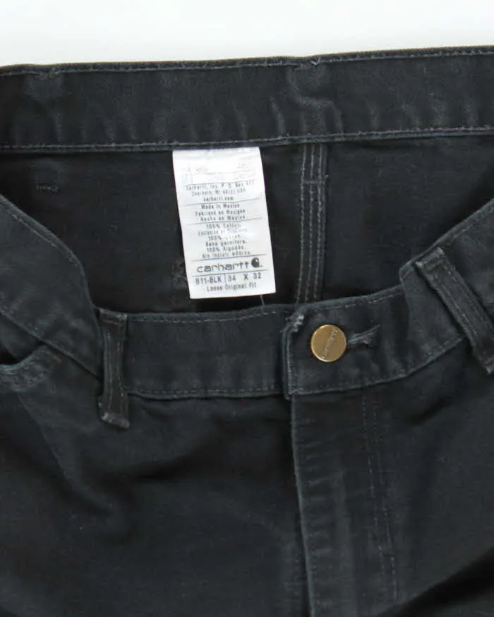 Vintage Carhartt Heavyweight Single Knee Faded Black Carpenter Trousers - W34 L30 sold by Rokit product image thumbnail 5