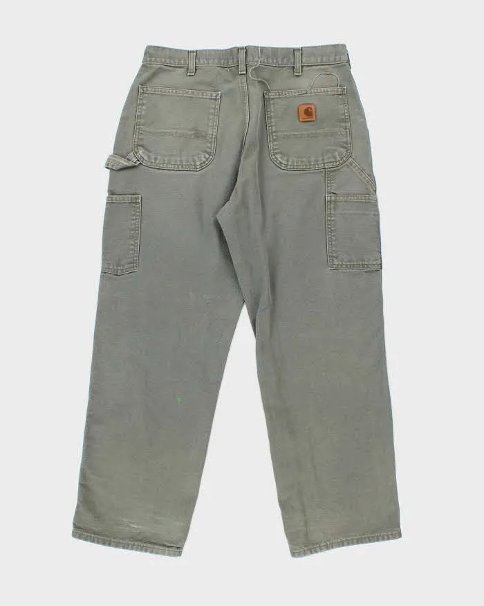 Vintage Carhartt Heavyweight Single Knee Green Carpenter Trousers - W34 L28 sold by Rokit product image thumbnail 2