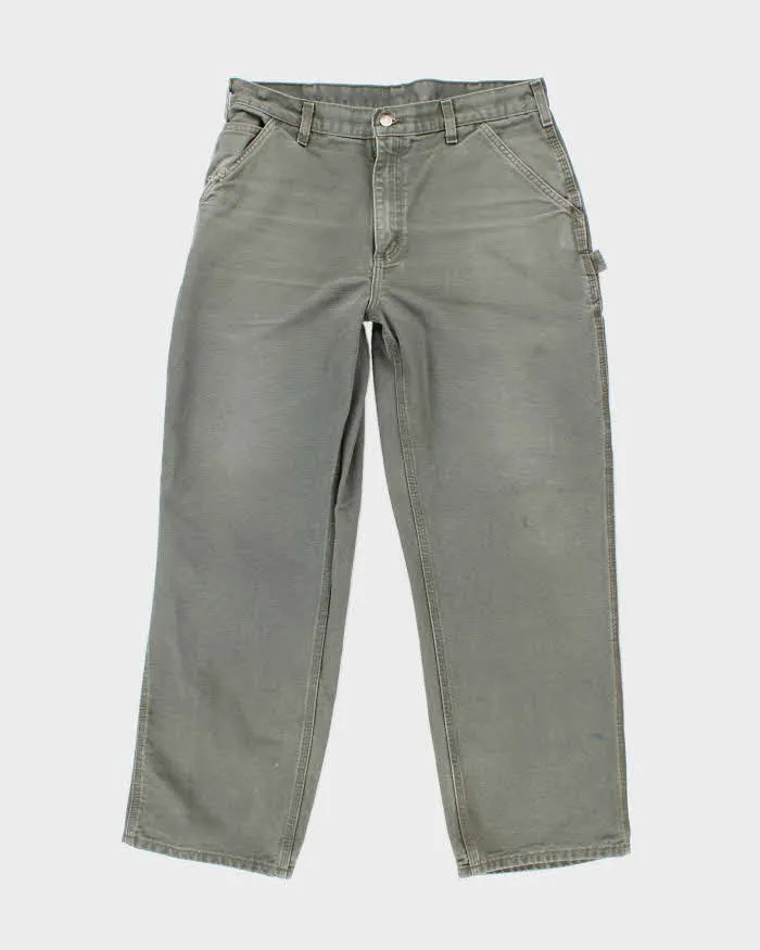 Vintage Carhartt Heavyweight Single Knee Green Carpenter Trousers - W34 L28 sold by Rokit
