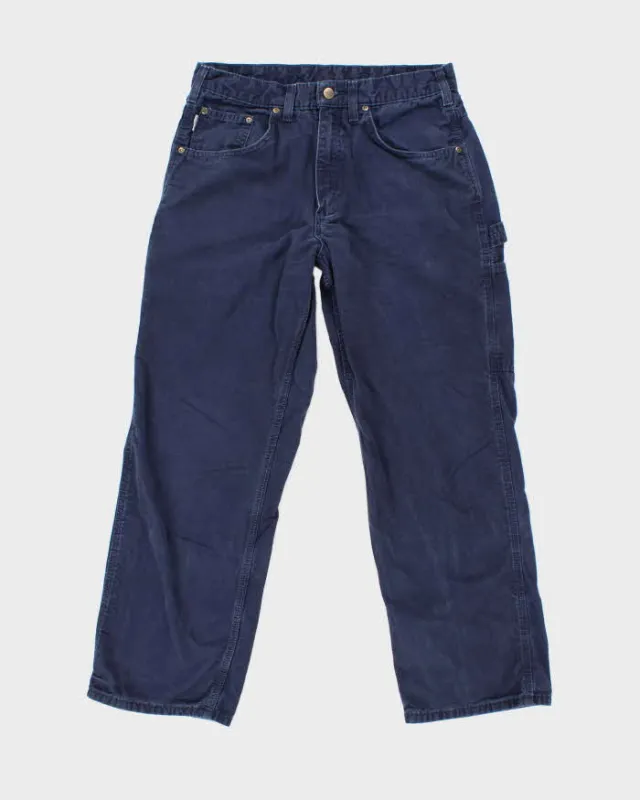 Vintage Carhartt Heavyweight Single Knee Blue Faded Carpenter Trousers - W32 L26 sold by Rokit