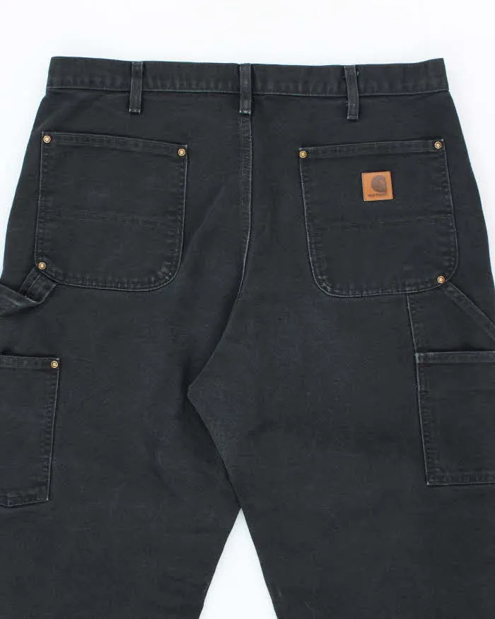 Vintage Carhartt Heavyweight Double Knee Black Carpenter Trousers - W34 L30 sold by Rokit product image thumbnail 4
