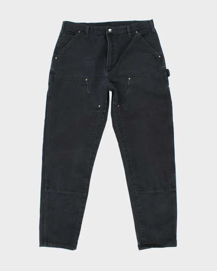 Vintage Carhartt Heavyweight Double Knee Black Carpenter Trousers - W34 L30 sold by Rokit