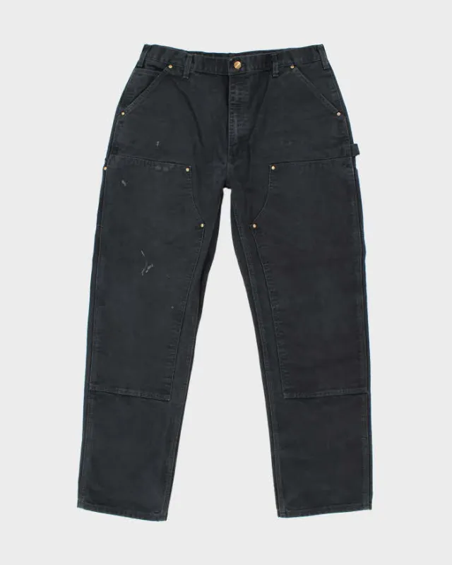 Vintage Carhartt Double Knee Black Faded Carpenter Trousers - W36 L33 sold by Rokit