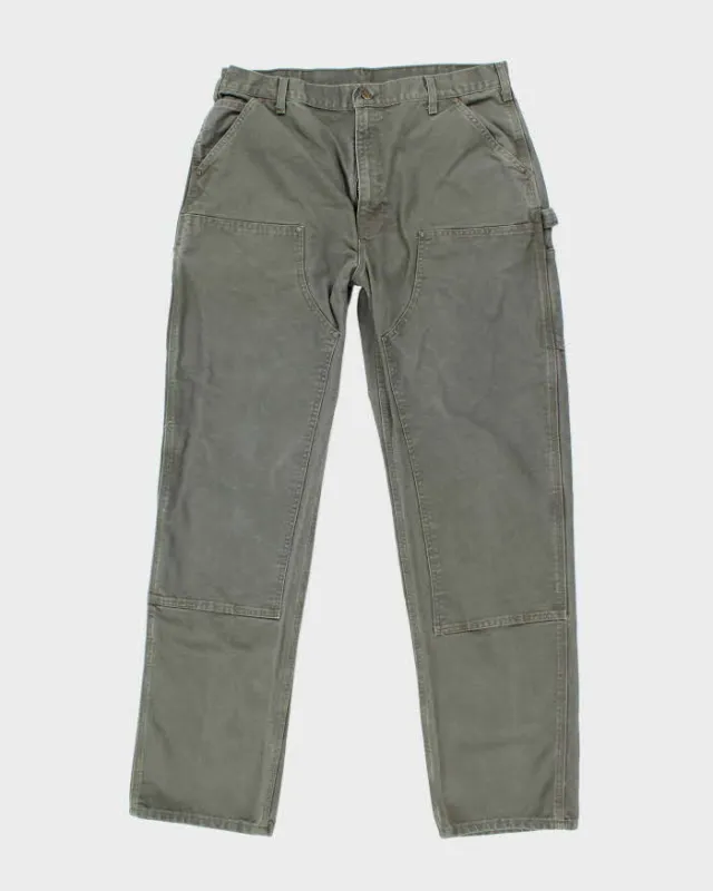 Vintage Carhartt Heavyweight Double Knee Green Carpenter Trousers - W36 L34 sold by Rokit