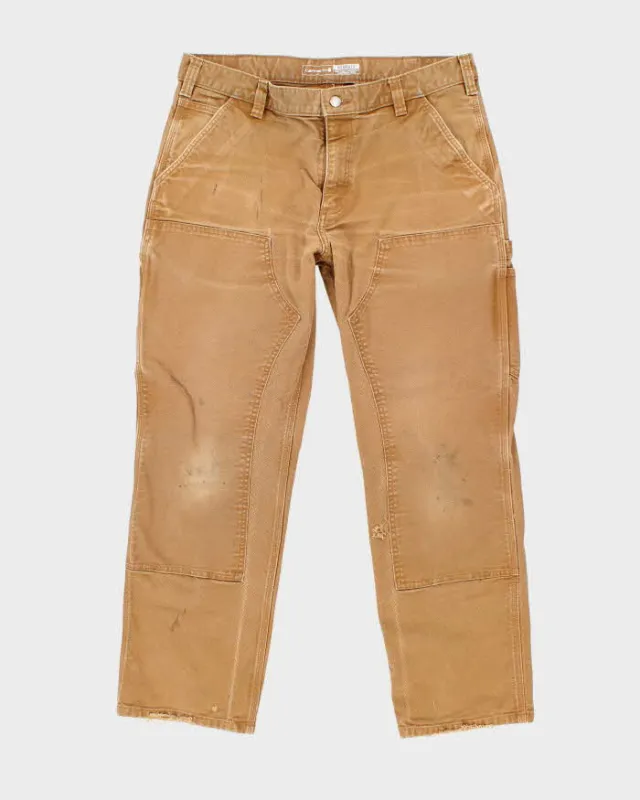 Vintage Carhartt Heavyweight Double Knee Beige Faded Carpenter Trousers - W34 L28 sold by Rokit