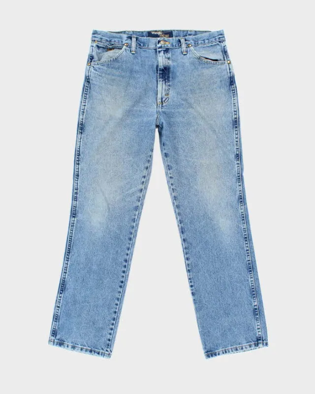 Vintage Wrangler Faded Medium Wash Straight Leg Jeans - W34 L30 sold by Rokit
