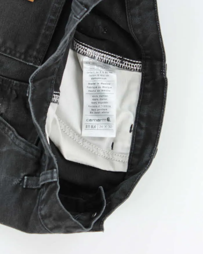Vintage Carhartt Single Knee Black Faded Carpenter Trousers - W34 L30 sold by Rokit product image thumbnail 5