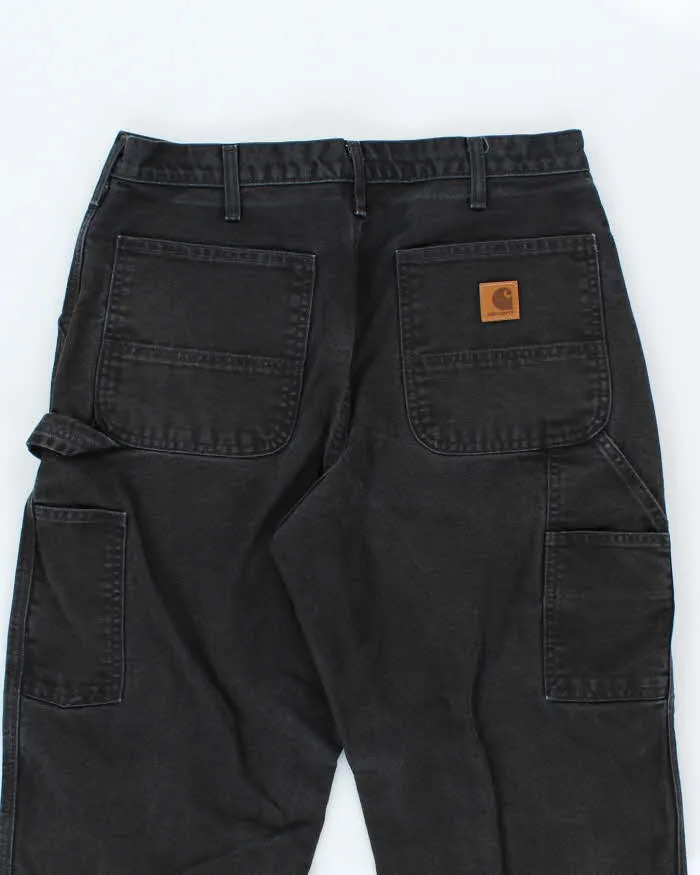 Vintage Carhartt Single Knee Black Faded Carpenter Trousers - W34 L30 sold by Rokit product image thumbnail 4