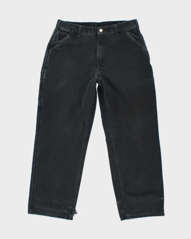 Vintage Carhartt Single Knee Black Faded Carpenter Trousers - W32 L27 sold by Rokit