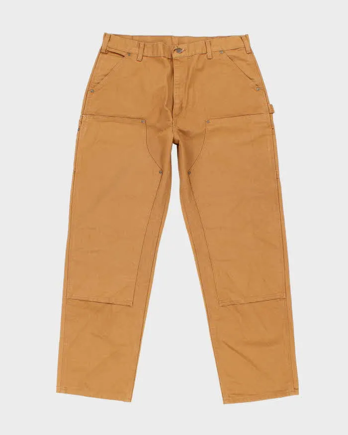 Vintage Carhartt Heavyweight Brown Double Knee Carpenter Trousers - W38 L34 sold by Rokit