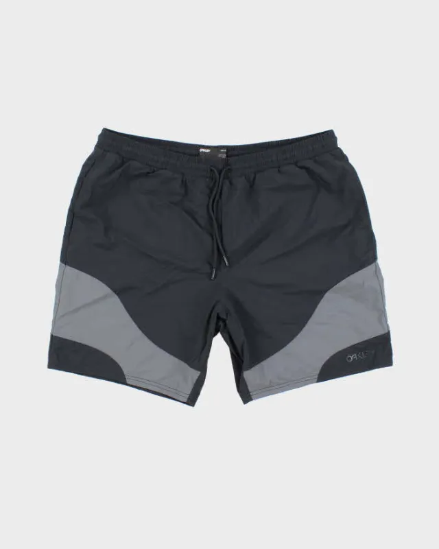Vintage Oakley Two Tone Sports Shorts - L sold by Rokit