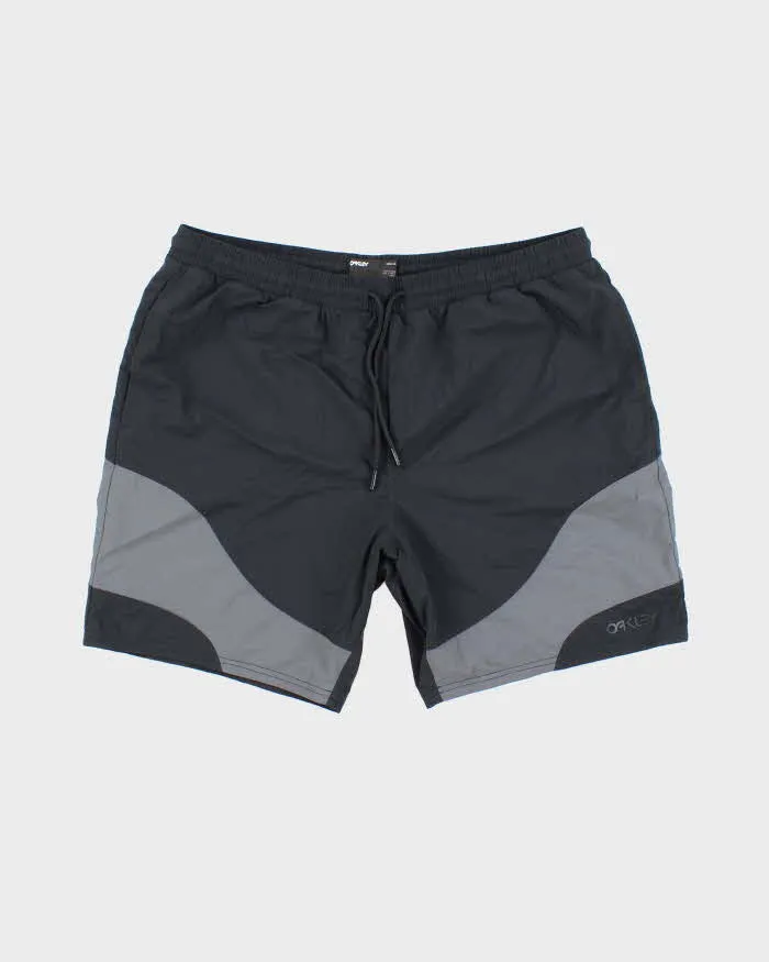 Vintage Oakley Two Tone Sports Shorts - L sold by Rokit