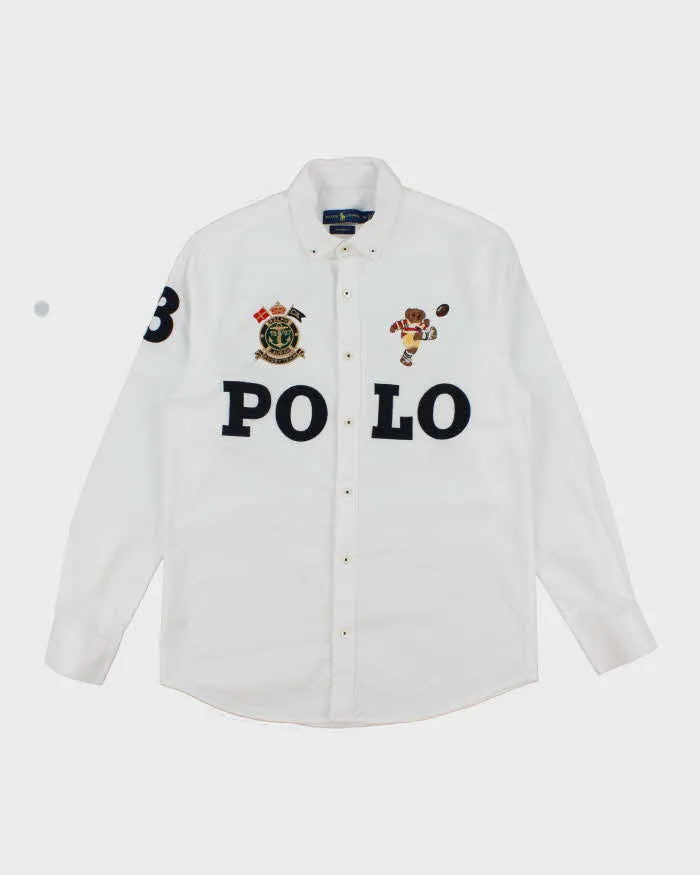 Vintage 2000's Ralph Lauren Patched Polo Spell Out Long Sleeve Shirt - XL sold by Rokit