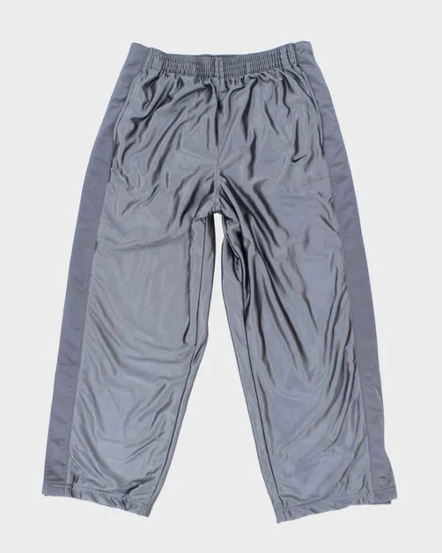 Vintage 90's Nike Hidden Leg Poppers Track Suit Bottoms - L sold by Rokit