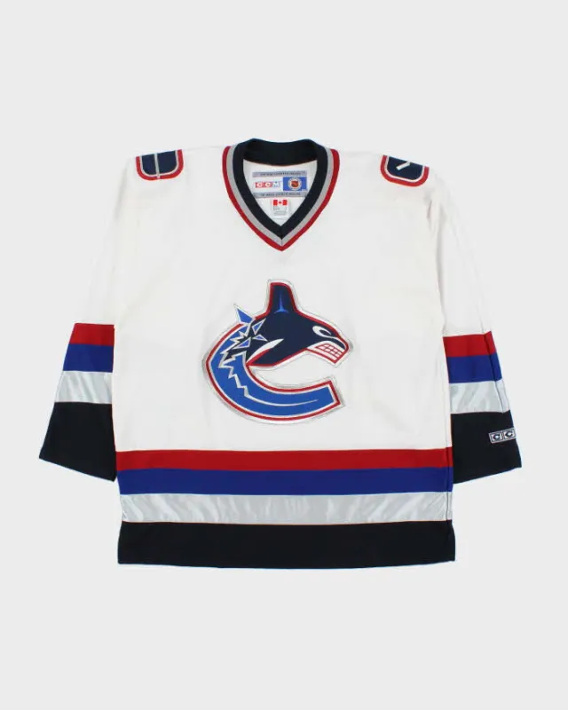 Vintage 1990s CCM Vancouver Canucks NHL Jersey - L sold by Rokit
