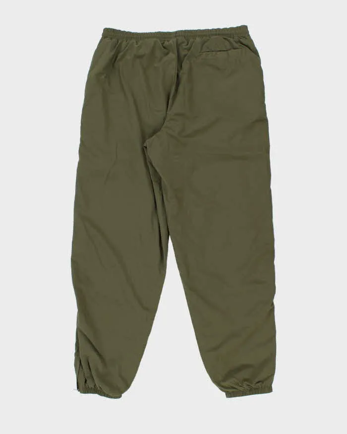 Vintage 1990s Khaki Nike Loose Fit Tracksuit Bottoms - W36 L32 sold by Rokit product image thumbnail 2