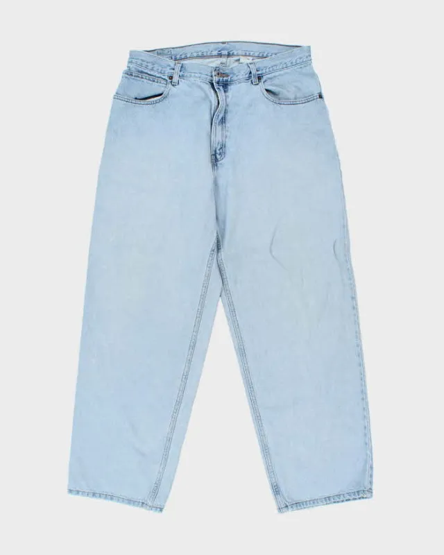 Vintage 1990s Levi's 595 Baggy Straight Fit Jeans - W34 L32 sold by Rokit