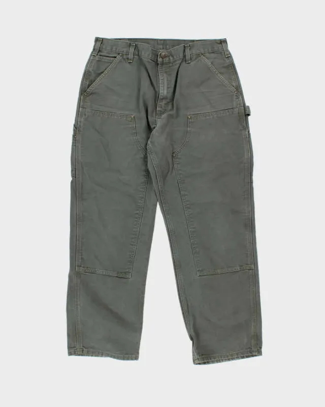 Vintage Carhartt Duck Double Front Loose Fit Workwear Trousers - W36 L30 sold by Rokit