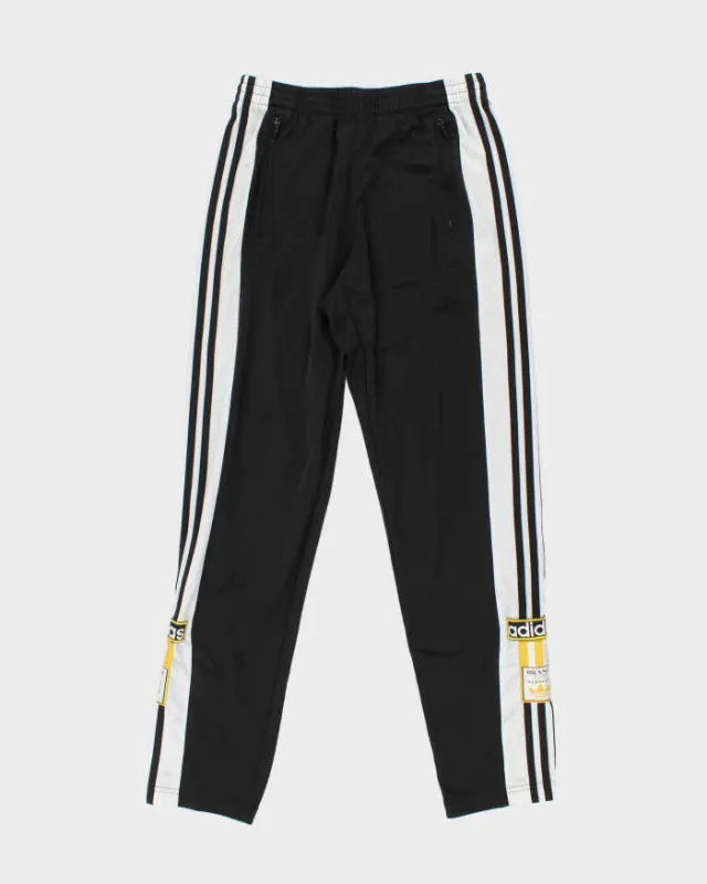 Vintage Adidas Popper Tracksuit Bottoms - M sold by Rokit