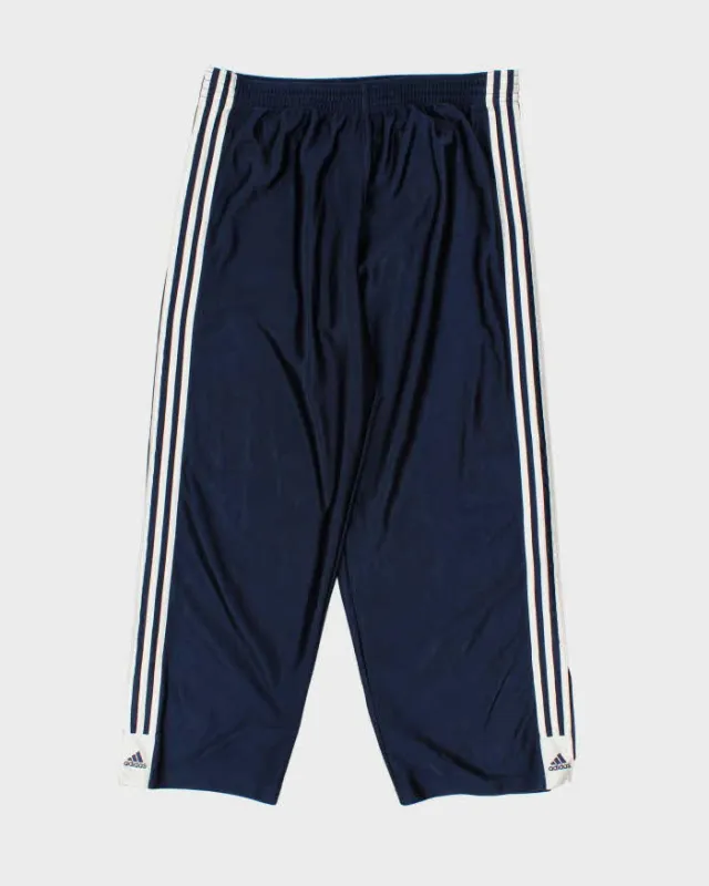 Vintage 00s Adidas Popper Tracksuit Bottoms - M sold by Rokit