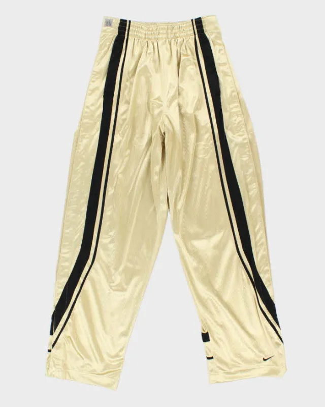 Vintage Y2K 00s Nike Basketball Gold Wide Leg Popper Tracksuit Bottoms - L sold by Rokit