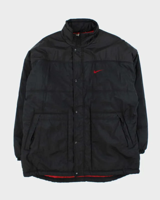 Vintage 1990s Black Nike Oversized Long Puffer Jacket - XL sold by Rokit